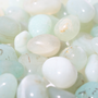Aqua Onyx Tumbled Stones (Enhanced) from Stonebridge Imports