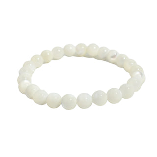 Shell White Round Bracelet - 8mm viewed from above, the full ring of round white shell beads on its stretch cord, on a clean white background. Stonebridge Imports.