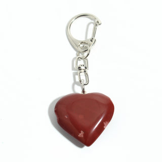 Red Jasper Heart Charm - Pack of 5 - a single polished deep red jasper heart from the pack on its silver-tone swivel clasp and keyring, photographed on a clean white background. Stonebridge Imports.