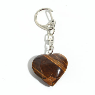Tiger Eye Heart Charm - Pack of 5 - a single polished golden-brown tiger eye heart from the pack on its silver-tone swivel clasp and keyring, photographed on a clean white background. Stonebridge Imports.