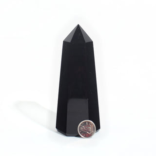 #5 - 150g to 249.9g — Black Obsidian Generator, polished six-sided tower with a faceted point, beside a Canadian dime for scale, photographed on a clean white background. Stonebridge Imports.