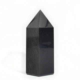 Black Obsidian Generator Unique #5 — polished six-sided tower with a faceted point, seen from a second angle, photographed on a clean white background. Stonebridge Imports.