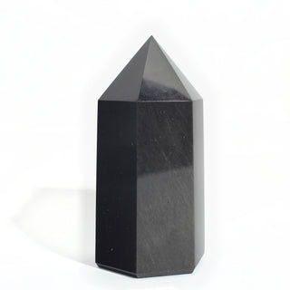 Black Obsidian Generator Unique #5 — polished six-sided tower with a faceted point, seen from a third angle, photographed on a clean white background. Stonebridge Imports.
