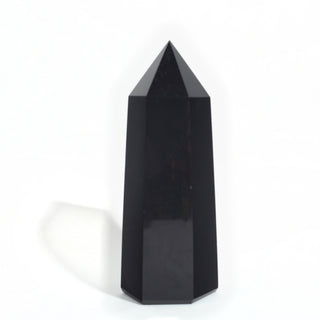 Black Obsidian Generator Unique #10 — polished six-sided tower with a faceted point, seen from a second angle, photographed on a clean white background. Stonebridge Imports.