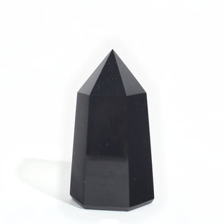 Black Obsidian Generator Unique #12 — polished six-sided tower with a faceted point, seen from a second angle, photographed on a clean white background. Stonebridge Imports.