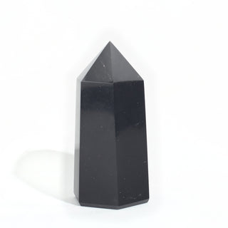 Black Obsidian Generator Unique #13 — polished six-sided tower with a faceted point, seen from a second angle, photographed on a clean white background. Stonebridge Imports.