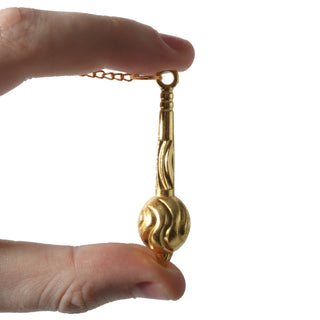 Golden Brass Gada Pendulum    from Stonebridge Imports