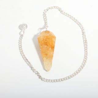 Golden Quartz Pendulum 6 Facet & Bead - 3 Pack, one yellow to amber golden quartz pendulum with its chain and bead handle, on a clean white background. Stonebridge Imports.