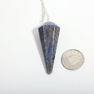 Sodalite Pendulum 6 Facet & Bead - 3 Pack, one deep blue sodalite pendulum beside a dime for scale, on a clean white background. Stonebridge Imports.