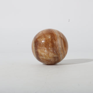 Golden Calcite Sphere Small #1 - 2" from Stonebridge Imports