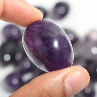 Amethyst Dark Tumbled Stones from Stonebridge Imports