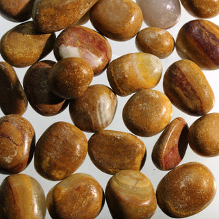 Aragonite Brown Tumbled Stones    from Stonebridge Imports