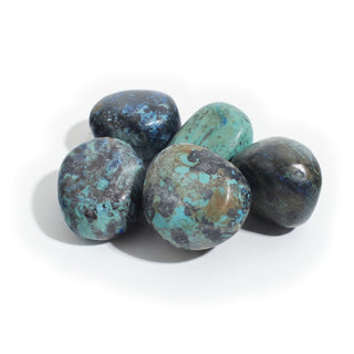 Large — Azurite Tumbled Stones, five polished navy-black stones mottled with vivid blue azurite and teal green, seen close up, photographed on a clean white background. Stonebridge Imports.