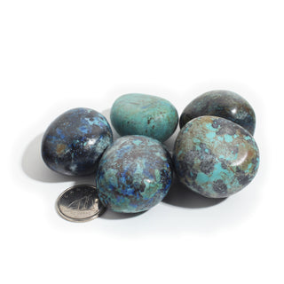 Large — Azurite Tumbled Stones, five polished dark blue and teal mottled stones beside a Canadian dime for scale, photographed on a clean white background. Stonebridge Imports.