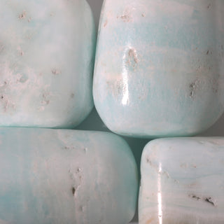 Caribbean Blue Calcite Tumbled Stones    from Stonebridge Imports