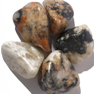 Cassiterite In Quartz Tumbled Stones    from Stonebridge Imports