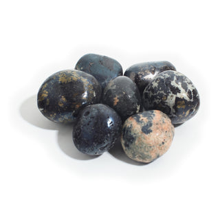 Large — Covellite Tumbled Stones, seven polished inky black stones flecked with gold pyrite, white and pink matrix, seen from above, photographed on a clean white background. Stonebridge Imports.