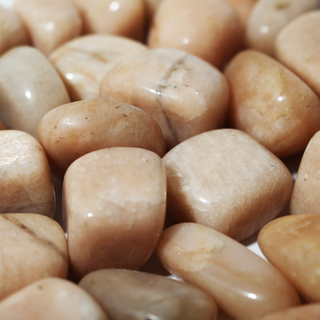 Cream Moonstone Tumbled Stones from Stonebridge Imports