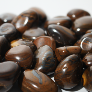 Tiger Iron Tumbled Stones from Stonebridge Imports