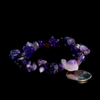 Dark Amethyst bead bracelet on a white background