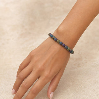 Rainbow Druzy Agate bead bracelet worn on the wrist, close-up