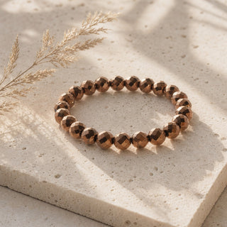 Hematite Faceted Copper Round Bracelet - 8mm from Stonebridge Imports