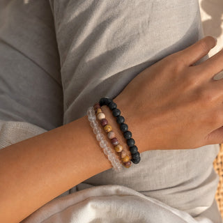 Mookaite Jasper bead bracelet stacked with other bead bracelets on the wrist