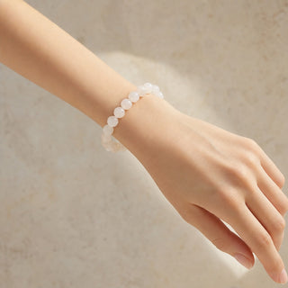 Moonstone bead bracelet worn on the wrist, close-up