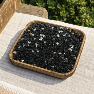 Obsidian Black Tumbled - Assorted Tiny in a wooden tray at a market stall