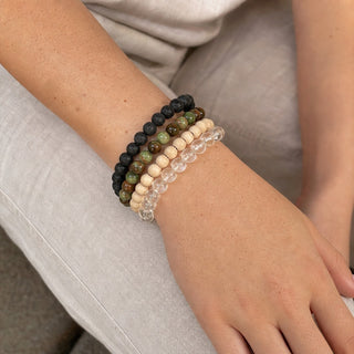 Opal bead bracelet stacked with other bead bracelets on the wrist