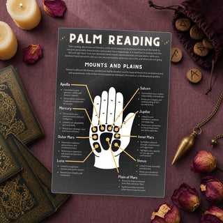 Palm Reading QuickStudy Guide laid out with crystals and props