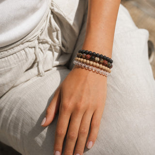 Picasso Jasper bead bracelet stacked with other bead bracelets on the wrist