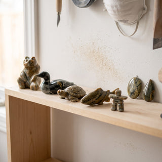 6x6x12 Carving Block - finished soapstone carvings on a shelf