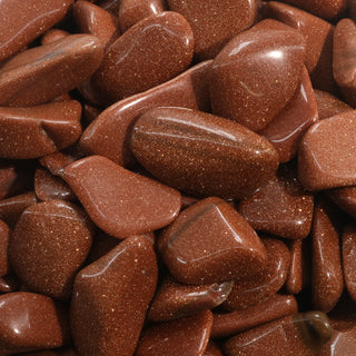 Brown Goldstone Tumbled Stones    from Stonebridge Imports