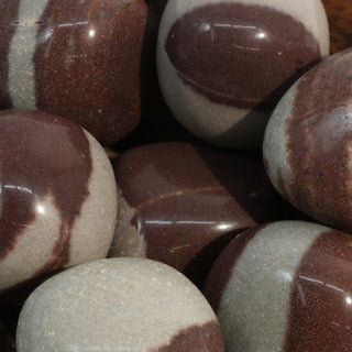 Narmada Shiva Lingam Tumbled Stones    from Stonebridge Imports