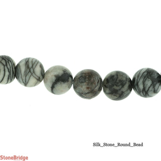 Silk Stone - Round Strand 15" - 6mm    from Stonebridge Imports