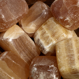 Calcite Honey Tumbled Stones    from Stonebridge Imports
